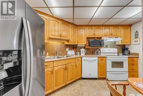 236 2301 Adelaide Street E, Saskatoon, SK - Indoor Photo Showing Kitchen With Double Sink