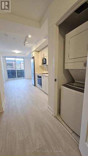 201 - 2545 Simcoe Street N, Oshawa, ON - Indoor Photo Showing Laundry Room