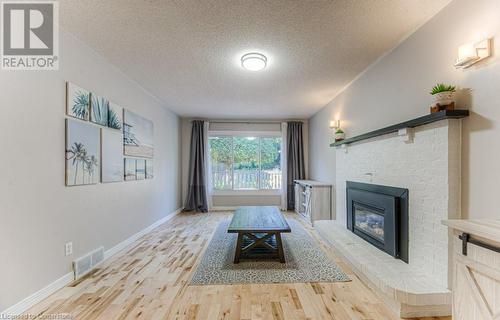 371 Strawberry Crescent, Waterloo, ON - Indoor Photo Showing Living Room With Fireplace