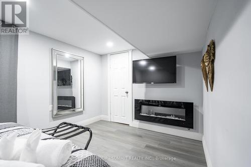 4622 Ferguson Street, Niagara Falls, ON - Indoor Photo Showing Living Room With Fireplace