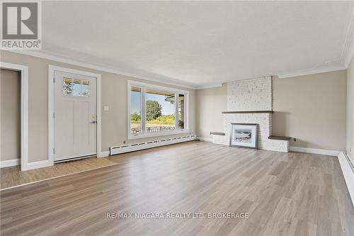 540 Concession 1 Road, Niagara-On-The-Lake, ON - Indoor Photo Showing Living Room With Fireplace