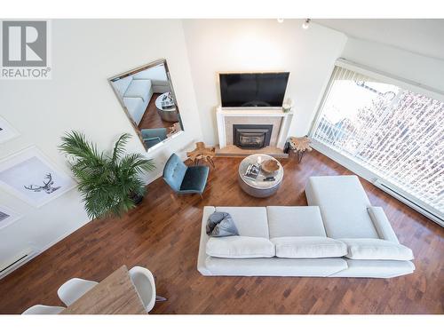 L01 788 W 8Th Avenue, Vancouver, BC - Indoor Photo Showing Living Room With Fireplace