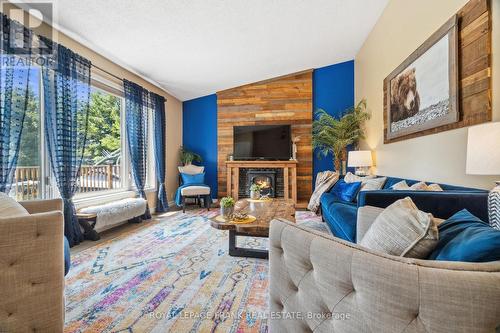 B1695 Highway 48 E, Brock (Beaverton), ON - Indoor Photo Showing Living Room With Fireplace