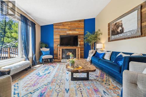 B1695 Highway 48 E, Brock (Beaverton), ON - Indoor Photo Showing Living Room With Fireplace