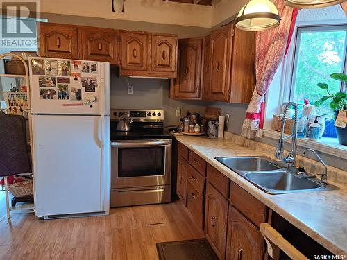 303 3Rd Street, Vonda, SK - Indoor Photo Showing Kitchen With Double Sink