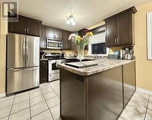 701 4Th Avenue, Raymore, SK - Indoor Photo Showing Kitchen With Stainless Steel Kitchen