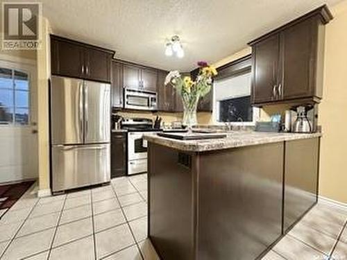 701 4Th Avenue, Raymore, SK - Indoor Photo Showing Kitchen With Stainless Steel Kitchen With Upgraded Kitchen