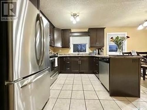 701 4Th Avenue, Raymore, SK - Indoor Photo Showing Kitchen With Stainless Steel Kitchen