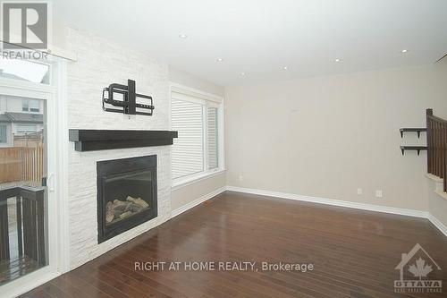 145 Popplewell Crescent, Ottawa, ON - Indoor With Fireplace