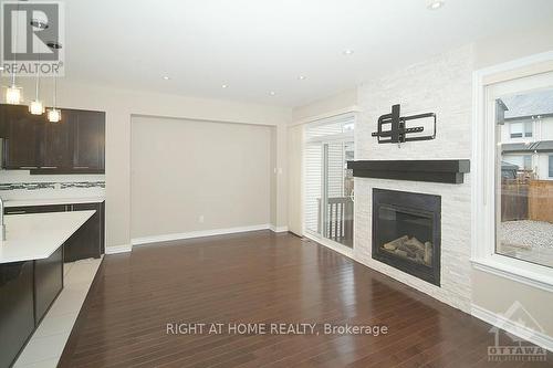 145 Popplewell Crescent, Ottawa, ON - Indoor Photo Showing Living Room With Fireplace