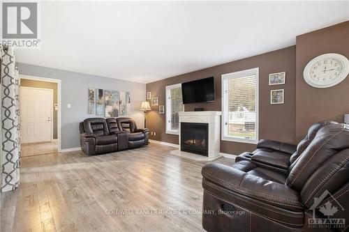 132 Corkery Woods Drive, Ottawa, ON - Indoor Photo Showing Living Room With Fireplace