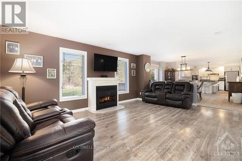 132 Corkery Woods Drive, Ottawa, ON - Indoor Photo Showing Living Room With Fireplace