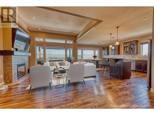 1010 Mt Revelstoke Place, Vernon, BC - Indoor Photo Showing Other Room With Fireplace