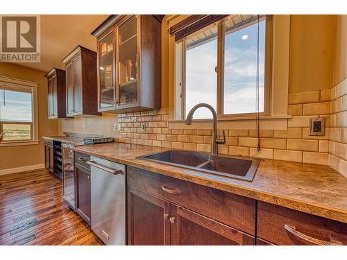 1010 Mt Revelstoke Place, Vernon, BC - Indoor Photo Showing Kitchen With Double Sink