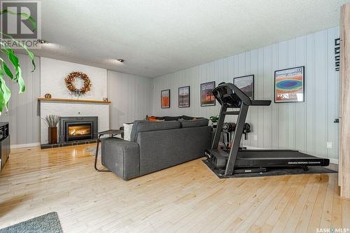 2513 Ewart Avenue, Saskatoon, SK - Indoor Photo Showing Gym Room With Fireplace