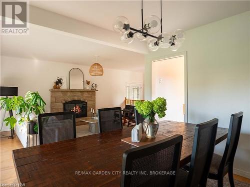 15 Rosemount Avenue, St. Catharines, ON - Indoor Photo Showing Dining Room With Fireplace