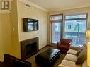 2950 Camozzi Road Unit# 3251, Revelstoke, BC  - Indoor Photo Showing Living Room With Fireplace 