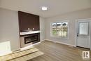 #Upper 8835 Carson Wy Sw, Edmonton, AB  - Indoor Photo Showing Living Room With Fireplace 