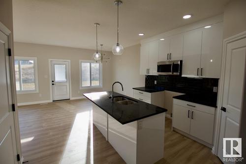 #Upper 8835 Carson Wy Sw, Edmonton, AB - Indoor Photo Showing Kitchen With Double Sink