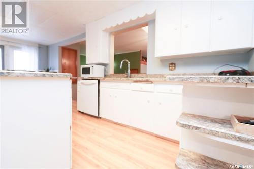 Wilkinson, Wallace Rm No. 243, SK - Indoor Photo Showing Kitchen With Double Sink