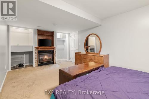 79 Oak Ridge Boulevard, Belleville, ON - Indoor Photo Showing Bedroom With Fireplace