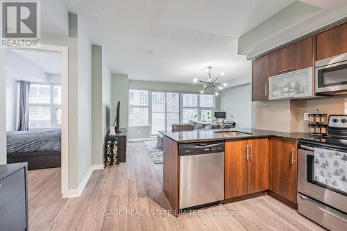 210 - 59 East Liberty Street, Toronto, ON - Indoor Photo Showing Kitchen With Stainless Steel Kitchen