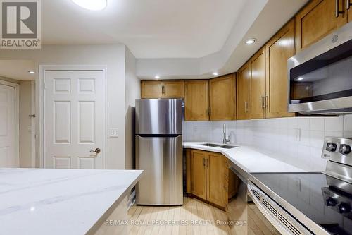 330 - 250 Wellington Street W, Toronto, ON - Indoor Photo Showing Kitchen With Stainless Steel Kitchen With Double Sink