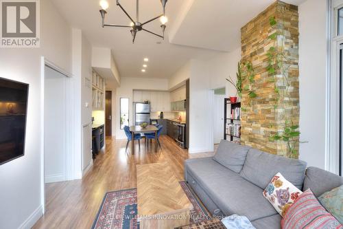 709 - 191 King Street S, Waterloo, ON - Indoor Photo Showing Living Room With Fireplace