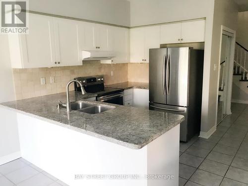 9 Firwood Drive, Richmond Hill, ON - Indoor Photo Showing Kitchen With Double Sink