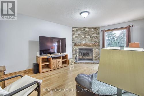 10 Delayne Drive, Aurora, ON - Indoor Photo Showing Living Room With Fireplace