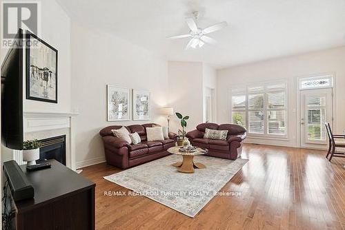 2 Suggs Lane, Whitchurch-Stouffville, ON - Indoor Photo Showing Living Room With Fireplace