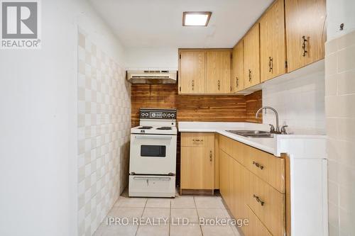 90 Stephen Drive, Toronto, ON - Indoor Photo Showing Kitchen With Double Sink