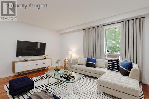 90 Stephen Drive, Toronto, ON - Indoor Photo Showing Living Room