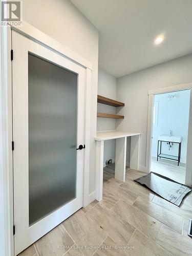 Main Floor Laundry - 358 Ivings Drive, Saugeen Shores, ON - Indoor Photo Showing Other Room