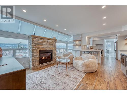 1160 Sunset Drive Unit# 1702, Kelowna, BC - Indoor Photo Showing Living Room With Fireplace