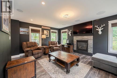 2638 Grand Tamarack Crescent, Severn, ON - Indoor Photo Showing Living Room With Fireplace