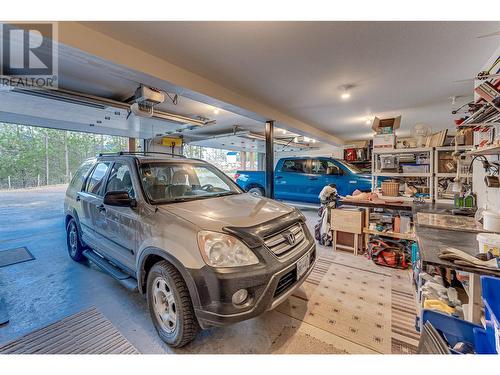 Basement Suite Tripple Garage - 645 St Annes Road, Spallumcheen, BC - Indoor Photo Showing Garage