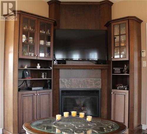 6218 Shannon Lane, Bainsville, ON - Indoor Photo Showing Living Room With Fireplace