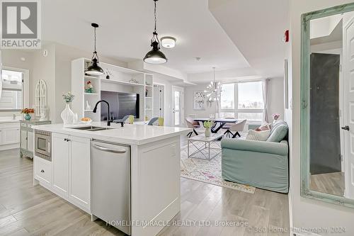 408 - 58 Adam Sellers Street, Markham, ON - Indoor Photo Showing Kitchen With Double Sink With Upgraded Kitchen