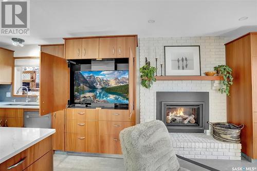 7535 Butler Bay, Regina, SK - Indoor Photo Showing Living Room With Fireplace