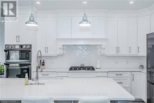 129 Ruth Anne Place, Mapleton, ON - Indoor Photo Showing Kitchen