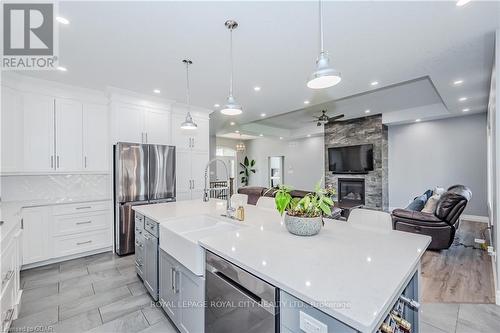 129 Ruth Anne Place, Mapleton, ON - Indoor Photo Showing Kitchen With Upgraded Kitchen