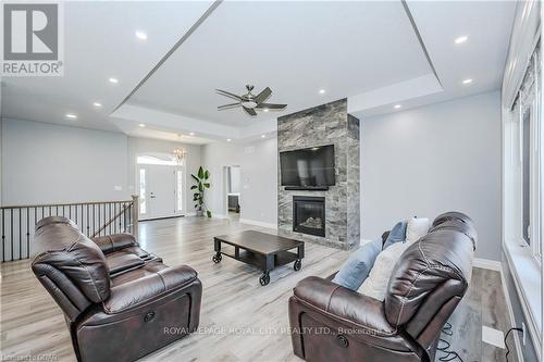 129 Ruth Anne Place, Mapleton, ON - Indoor Photo Showing Living Room With Fireplace