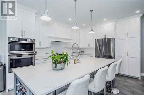 129 Ruth Anne Place, Mapleton, ON - Indoor Photo Showing Kitchen With Upgraded Kitchen