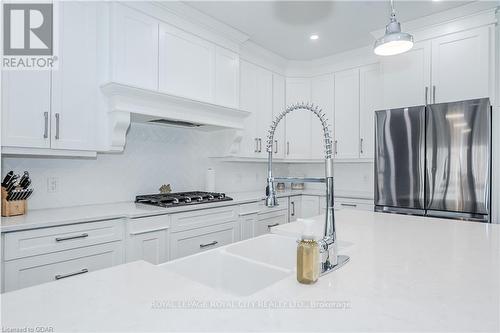 129 Ruth Anne Place, Mapleton, ON - Indoor Photo Showing Kitchen With Upgraded Kitchen