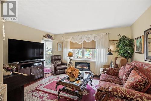 1236-1238 Churchill Street, Cornwall, ON - Indoor Photo Showing Living Room With Fireplace