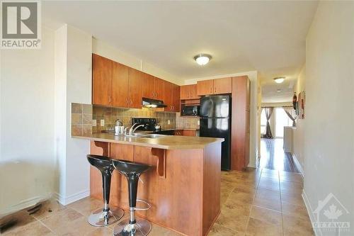 552 Chapman Mills Drive Unit#A, Ottawa, ON - Indoor Photo Showing Kitchen With Double Sink