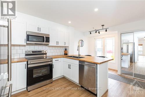 154 Chapman Mills Drive, Ottawa, ON - Indoor Photo Showing Kitchen With Stainless Steel Kitchen With Double Sink