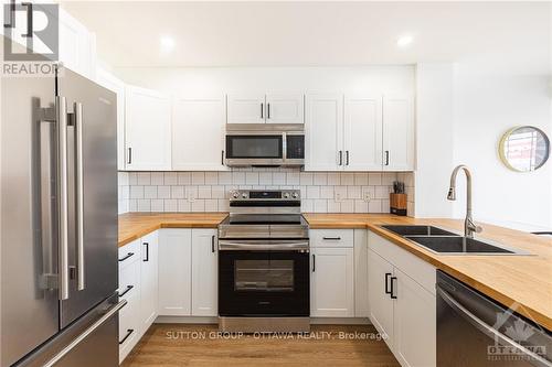 154 Chapman Mills Drive, Ottawa, ON - Indoor Photo Showing Kitchen With Stainless Steel Kitchen With Double Sink