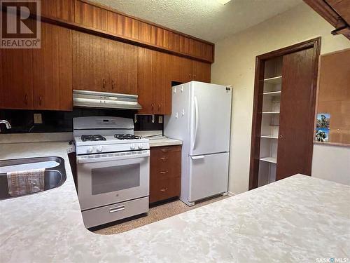 1702 98Th Street, Tisdale, SK - Indoor Photo Showing Kitchen With Double Sink